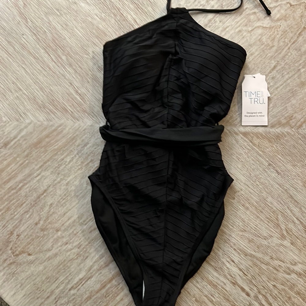 Brand new one piece bathing suit with tags.